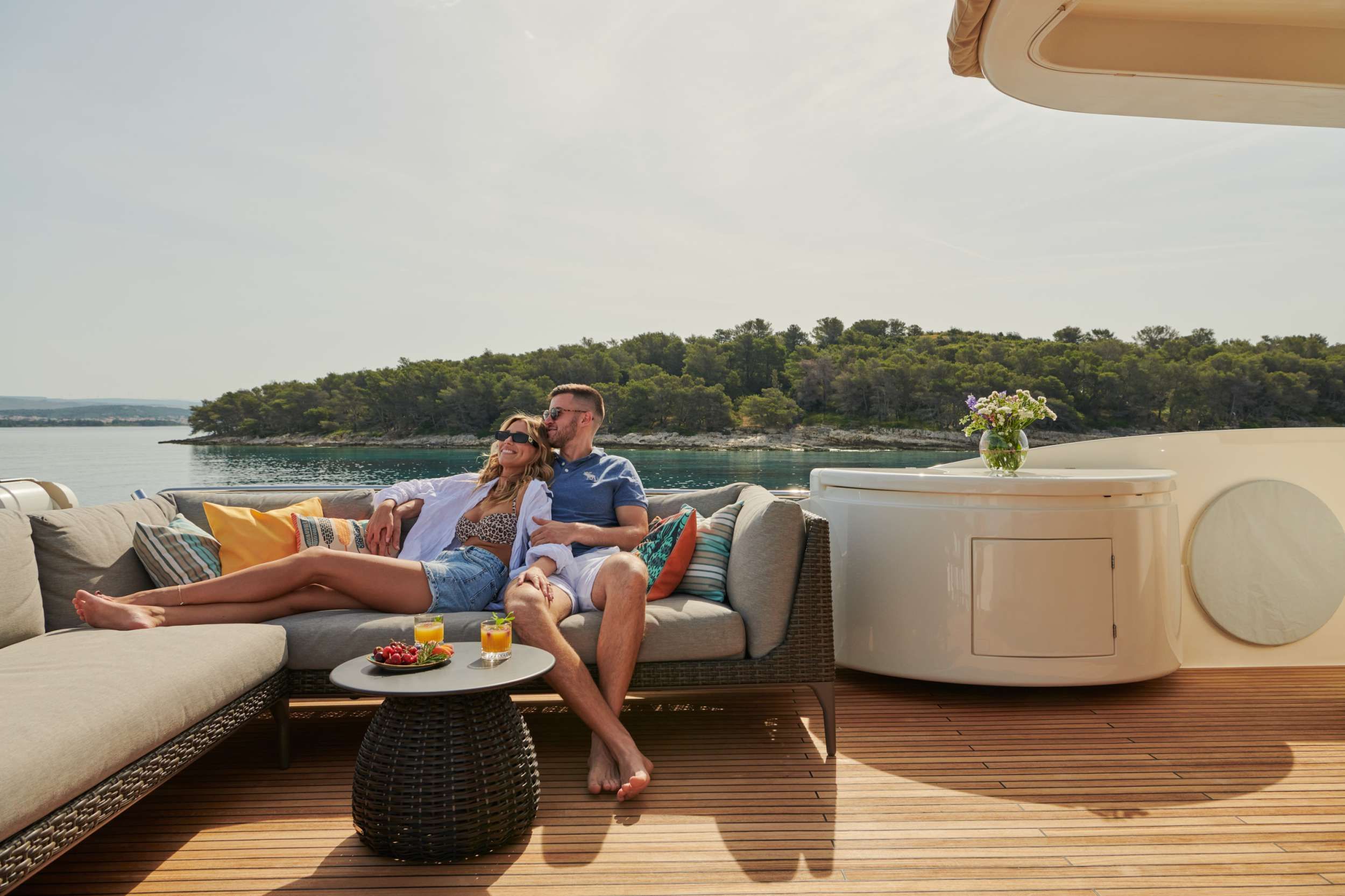 Superyacht guests on aft deck in Sibenik, Croatia